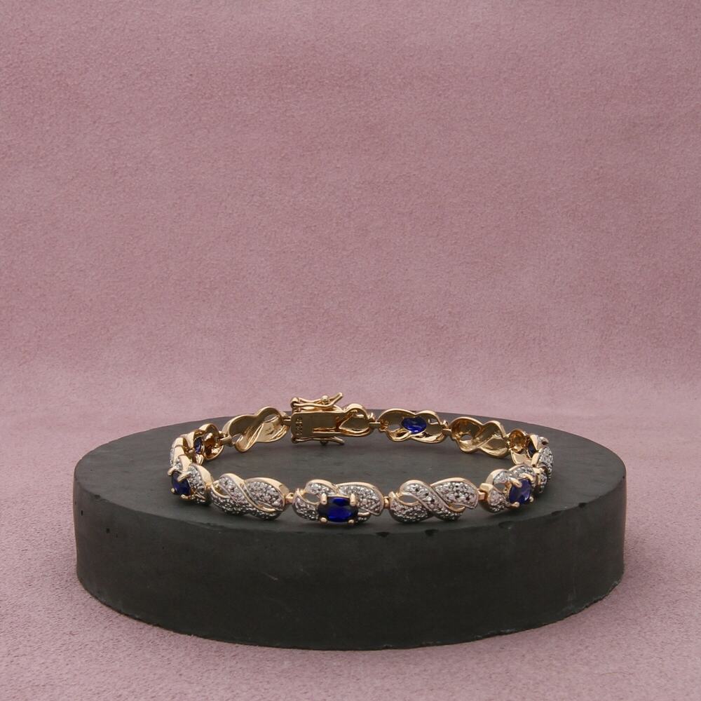 sterling silver gold plate sapphire x tennis bracelet size 7.5in